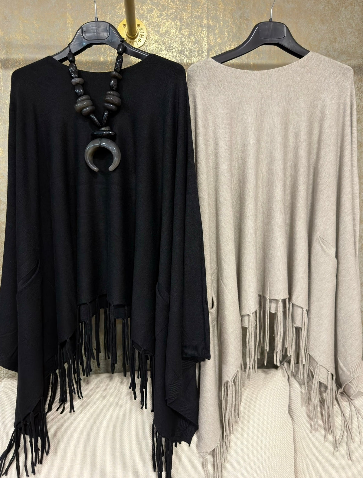 PONCHO CORTO PUNFLE